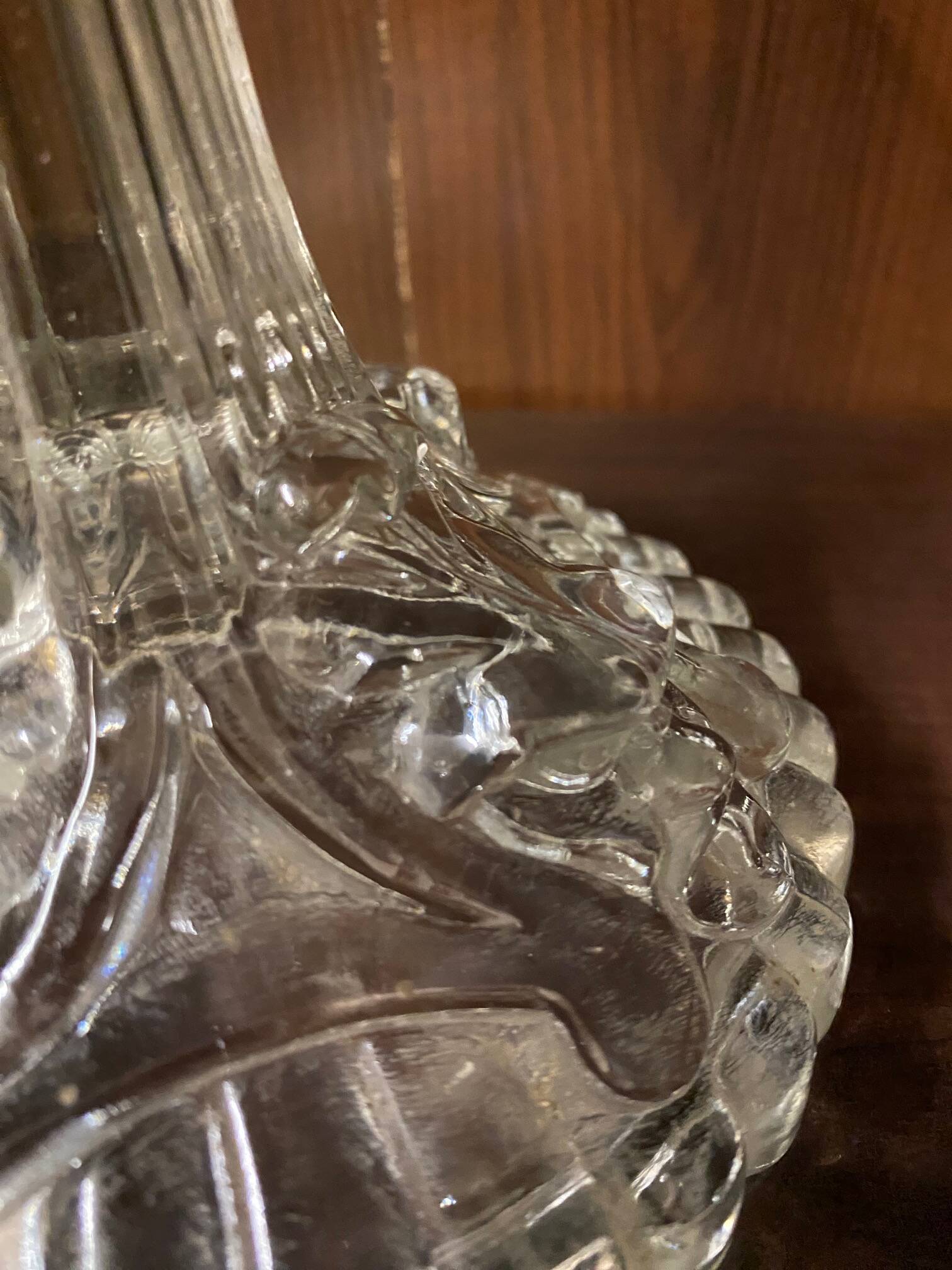 pair of cut glass candlesticks with lion and ram head decor, late 19th century