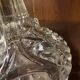 pair of cut glass candlesticks with lion and ram head decor, late 19th century