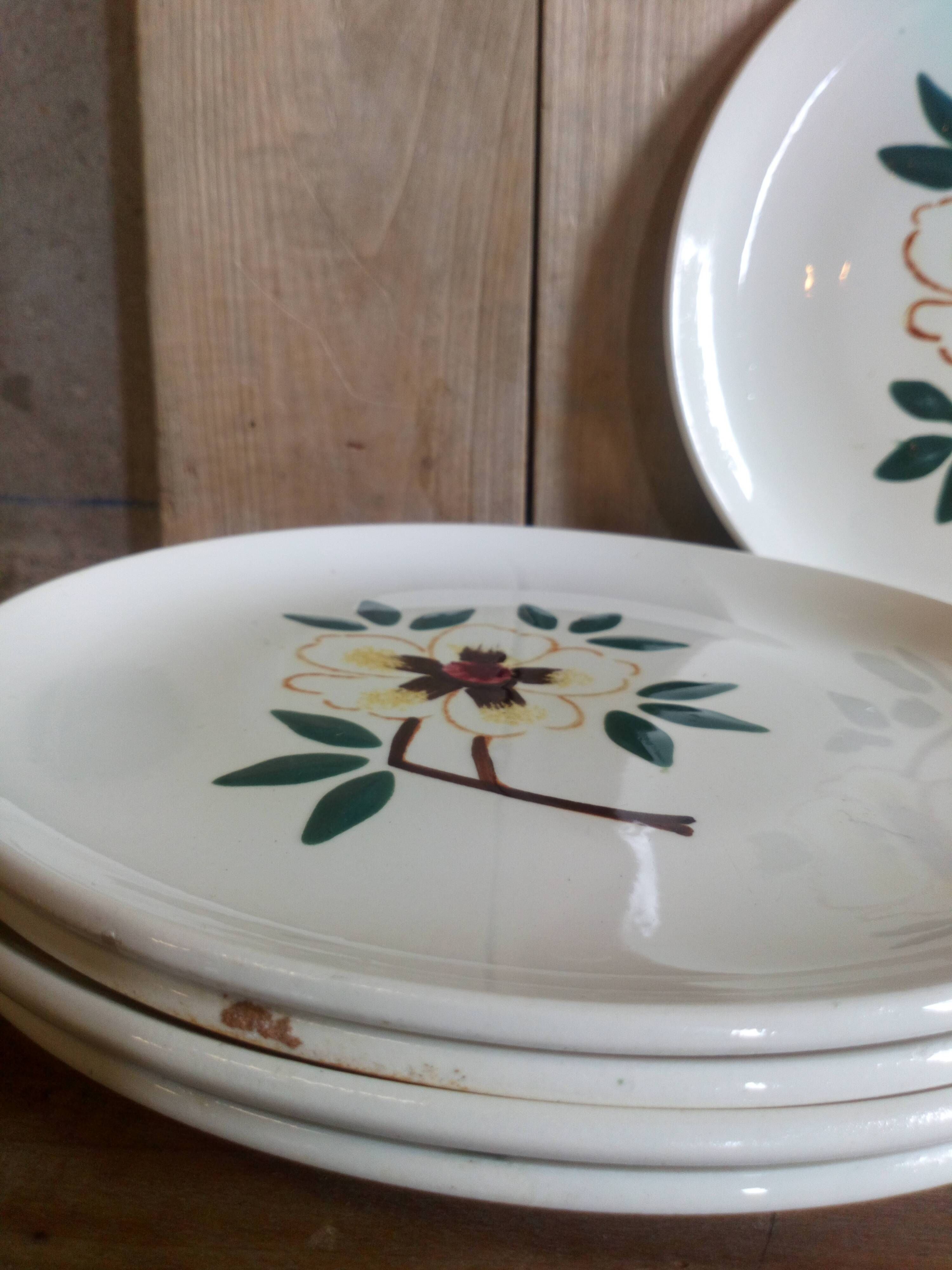 Five flowery dessert plates from continental earthenware