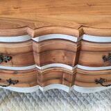 Walnut crossbow chest of drawers