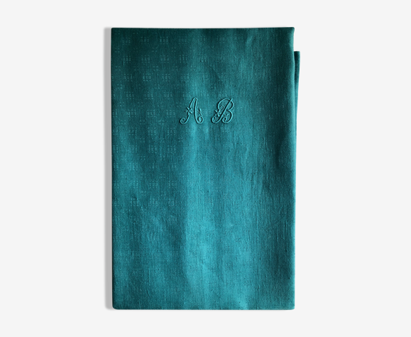 Old damask tablecloth tinted in lagoon blue