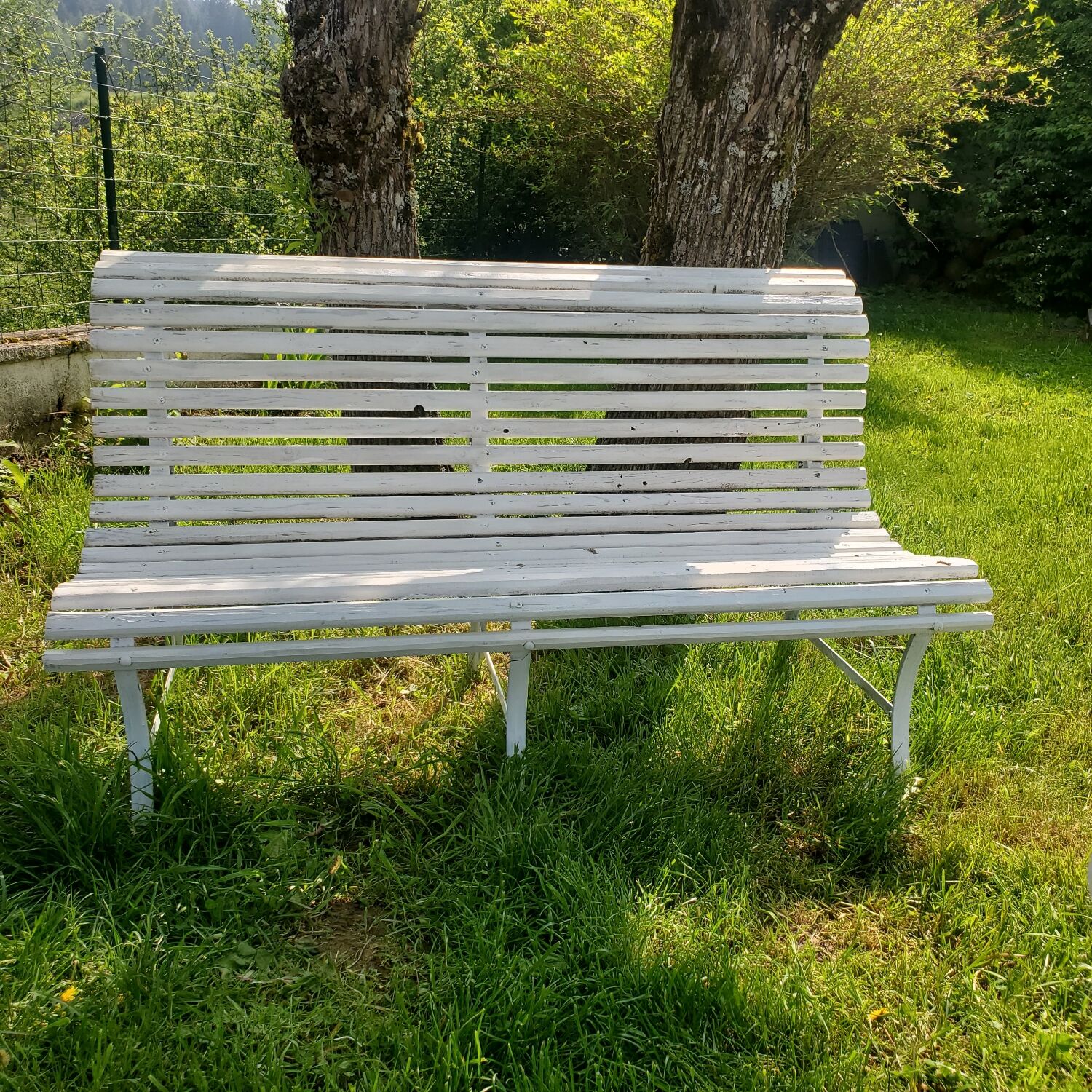 Outdoor slatted bench
