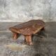 Small stool, footrest in blond teak, organic monoxyle with cut corners.