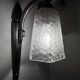 Silver Art Deco wall lights with frosted glass.