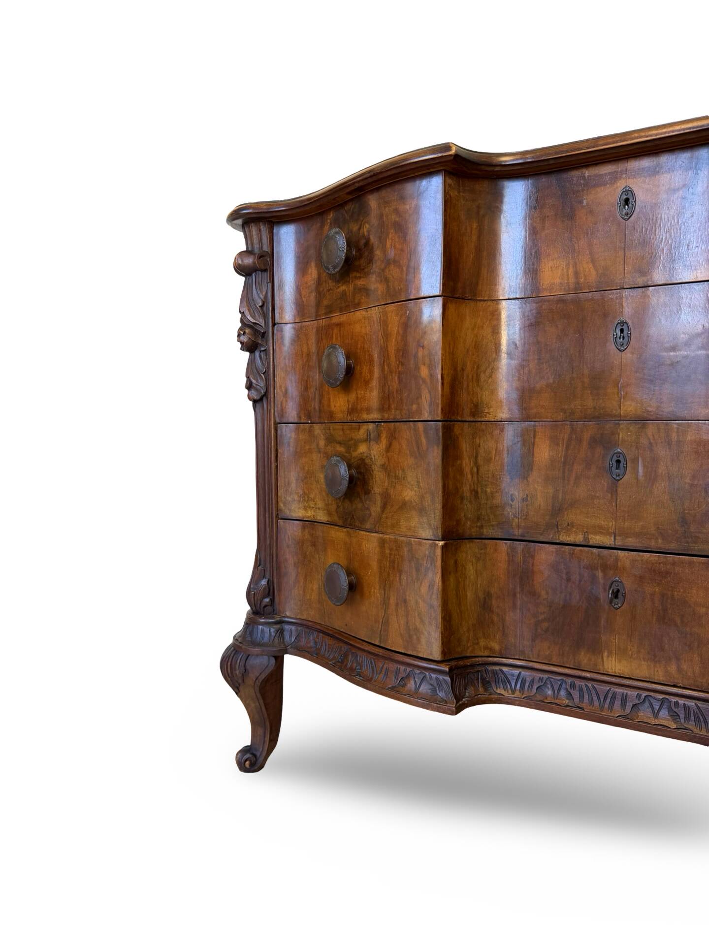 serpentine commode in antique walnut