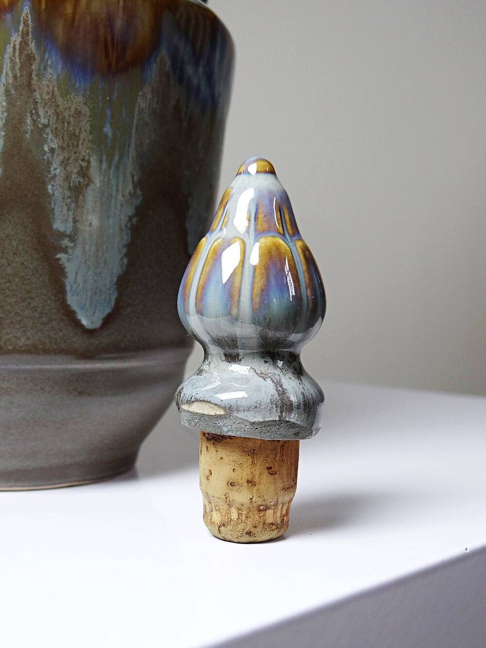 Vintage stoneware bottle with flamed glaze, France 1950-1970.