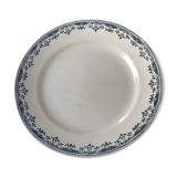 Round serving dish from the Longchamp earthenware factory, Doria model. Iron Land