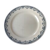 Round serving dish from the Longchamp earthenware factory, Doria model. Iron Land