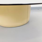 Vintage round coffee table in glass, leather, and metal in Space Age style from the 70s.