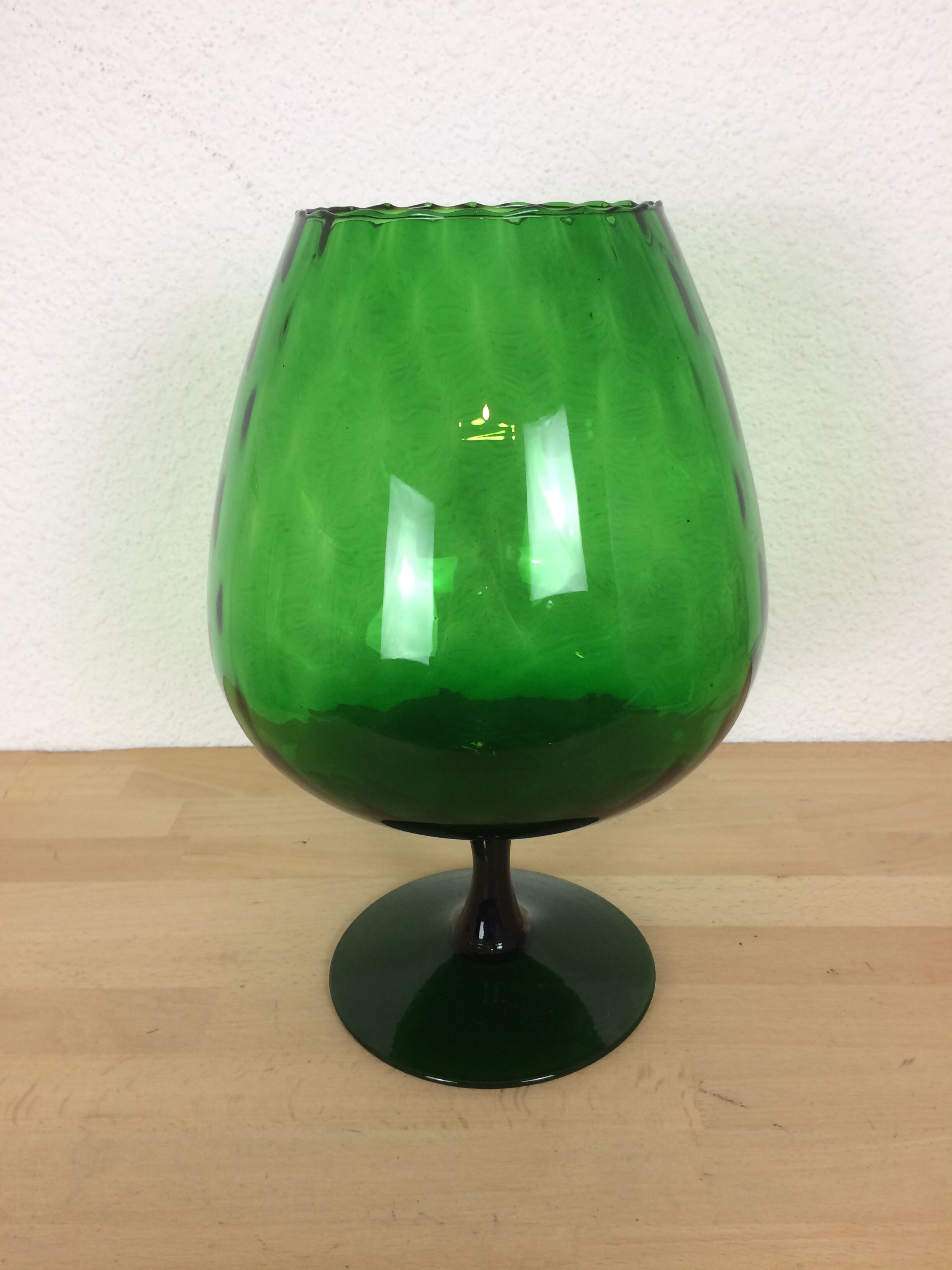 Green Empoli glass vase, cut on foot