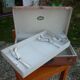 Green cardboard suitcase