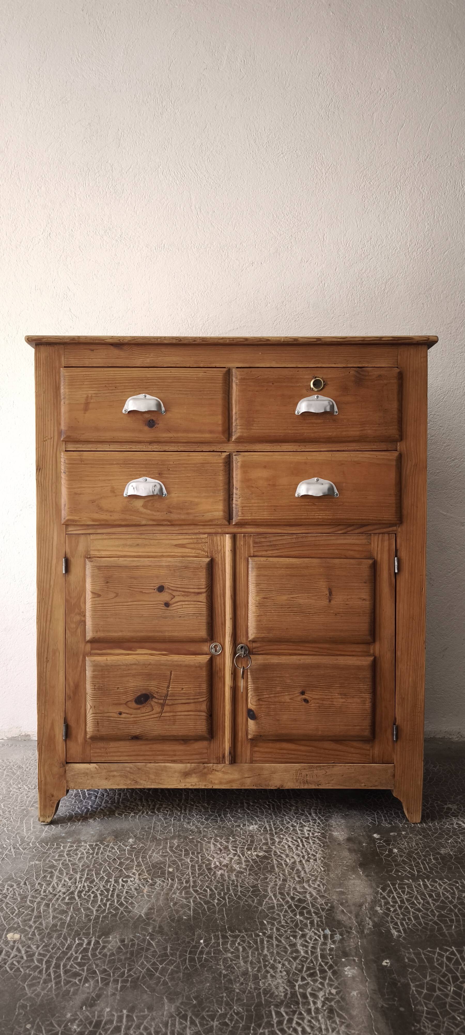 Small antique workshop furniture made of solid wood.