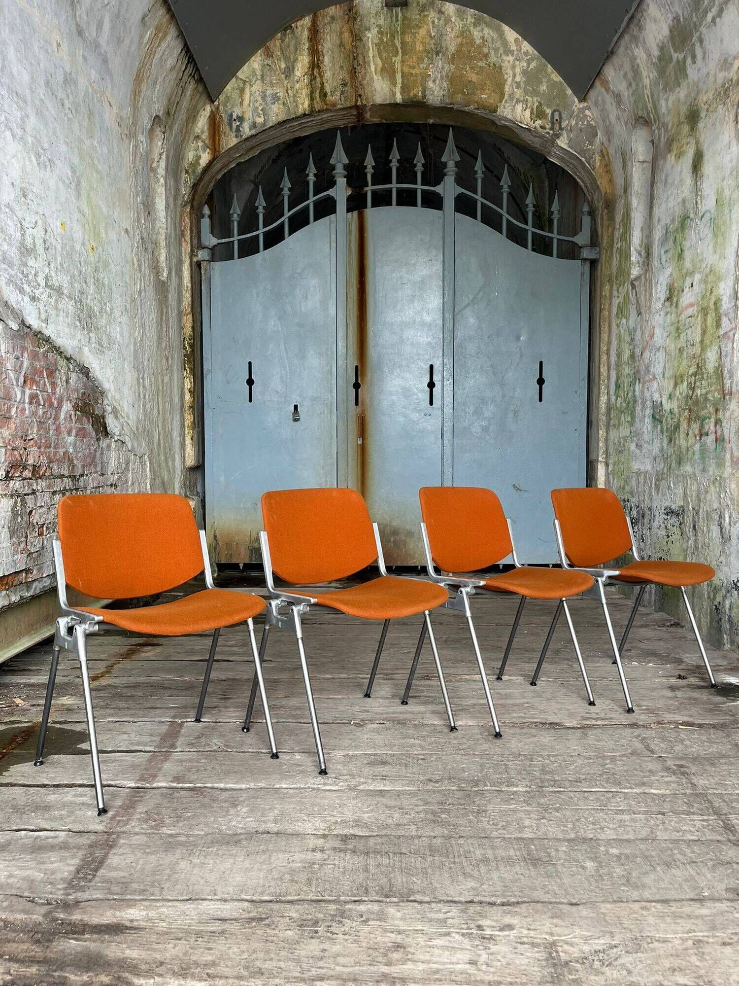 DSC 106 chair in orange by Giancarlo Piretti for Castelli, 1970s.