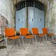 DSC 106 chair in orange by Giancarlo Piretti for Castelli, 1970s.