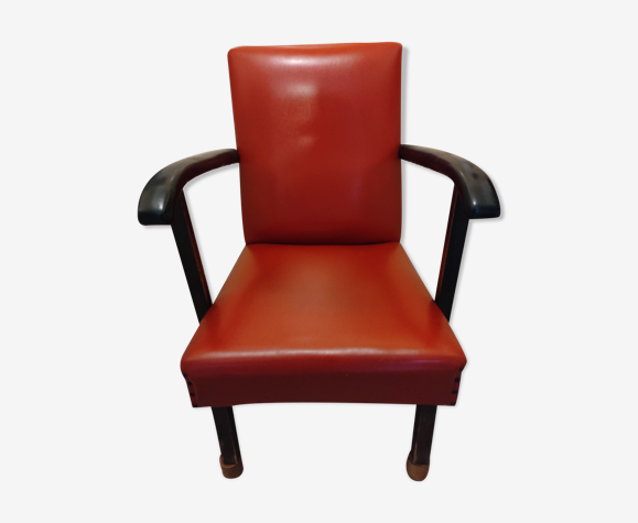 Ancien fauteuil skaï rouge