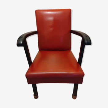 Old vintage red skai armchair