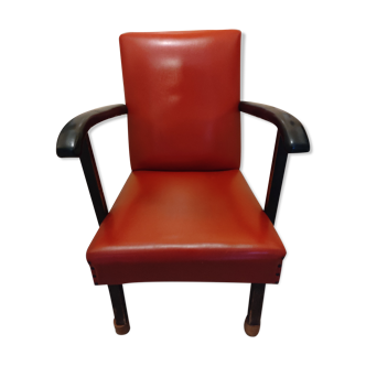 Ancien fauteuil skaï rouge