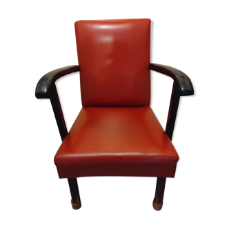 Old vintage red skai armchair