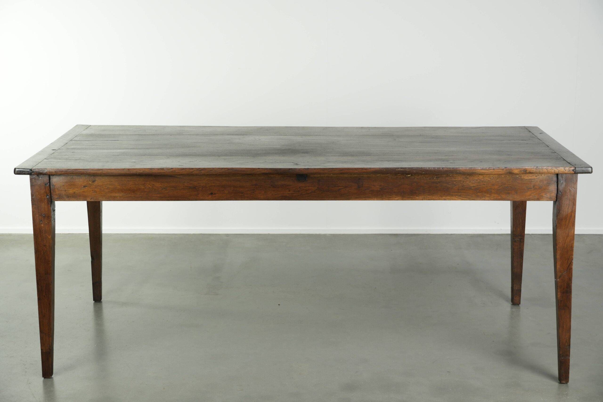 Antique French oak dining table from the early 19th century