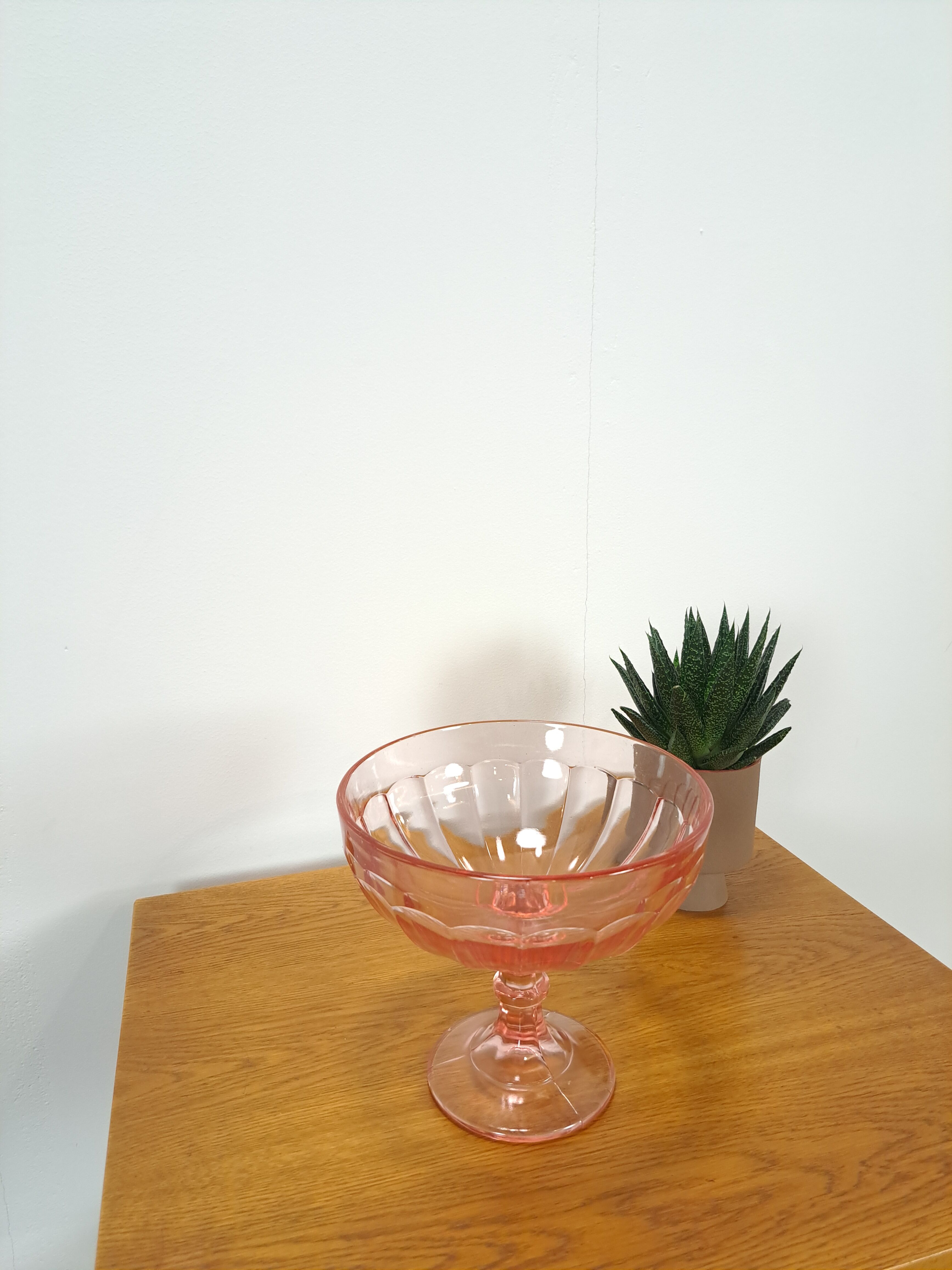 Pink glass bowl on base vintage