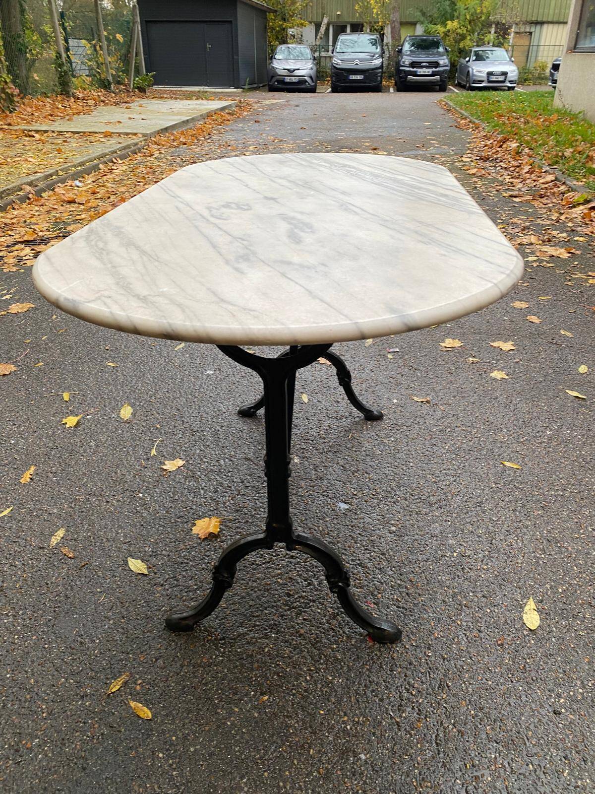 Table de bistrot marbre ovale et acier noire pétrole 4 couverts 140cm