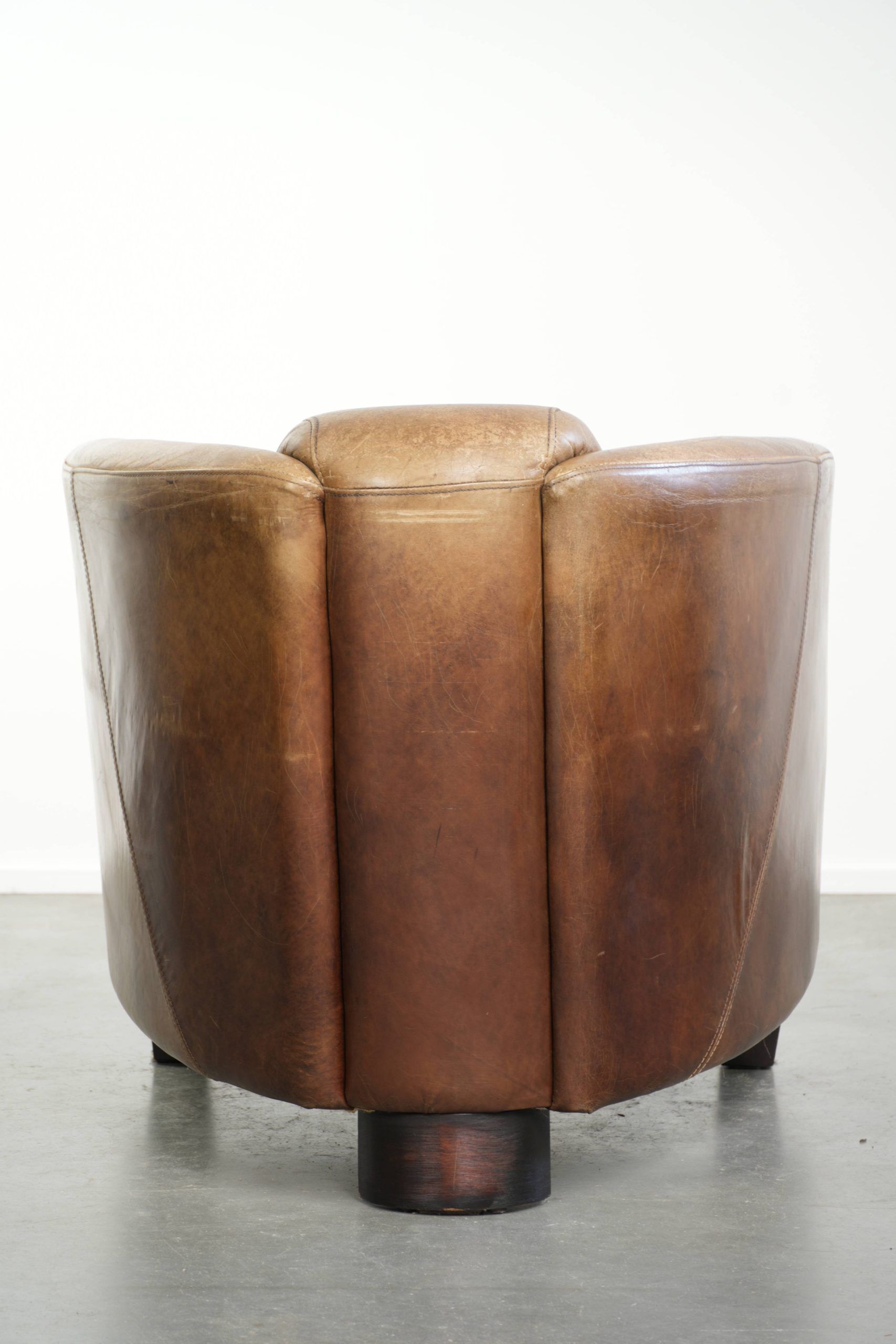 Fauteuil design aviateur en cuir de vache couleur cognac robuste