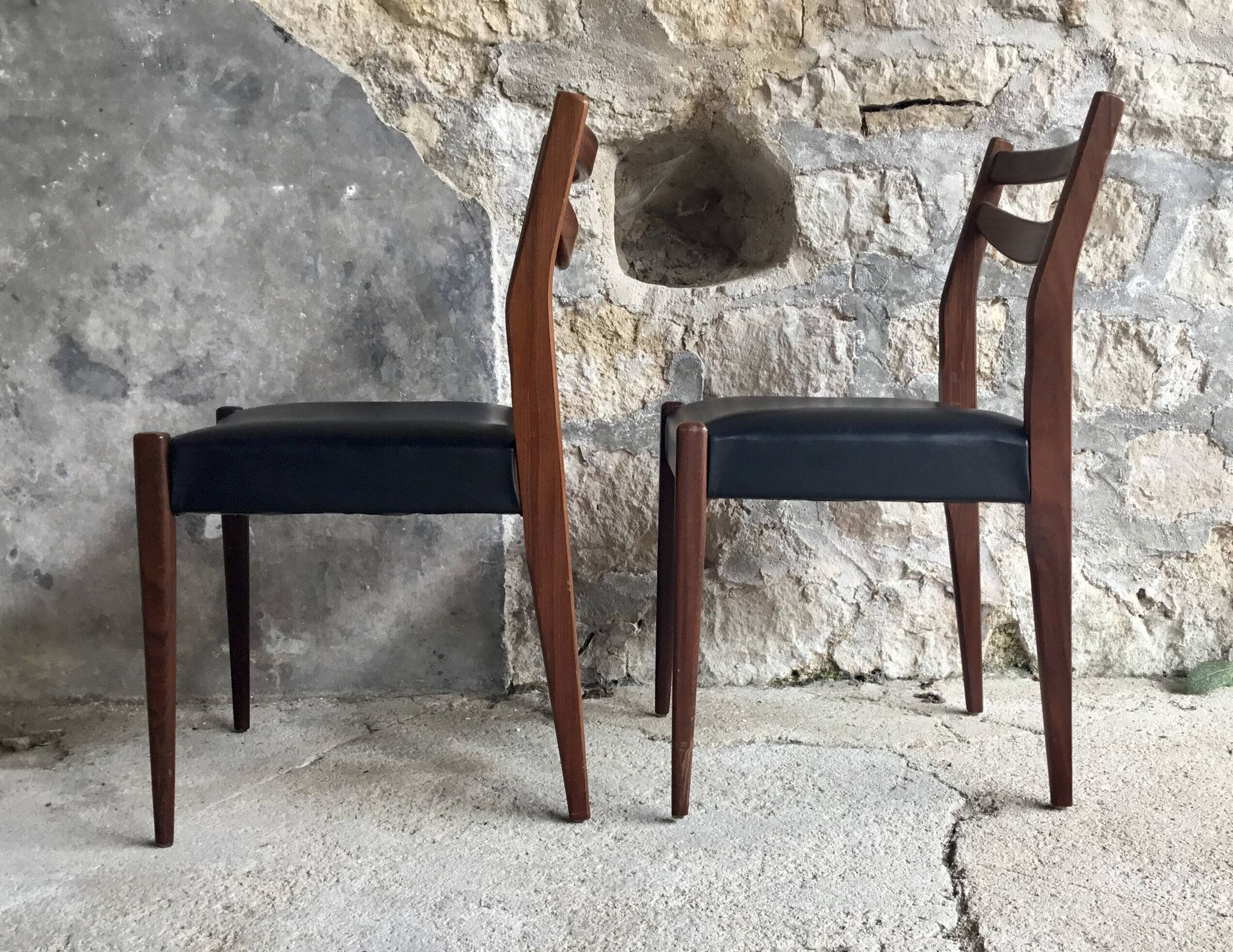 Pair of Scandinavian chairs Ameublement NF black imitation leather and teak - 1960