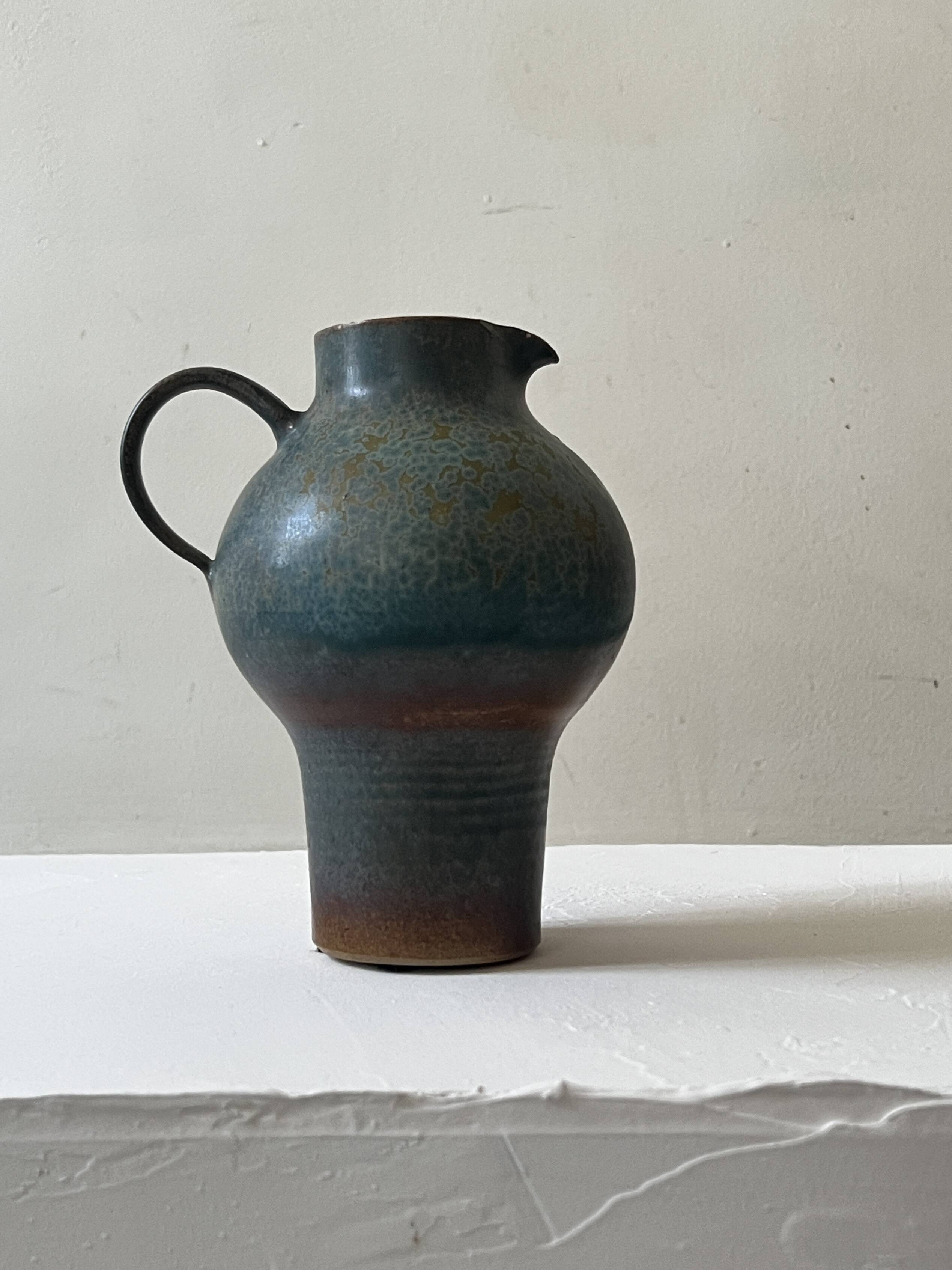 Brownish blue ceramic vase signed AH, France 1950.
