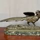 Rene Andre Varnier. Bronze figure of a pheasant on a green marble base.
