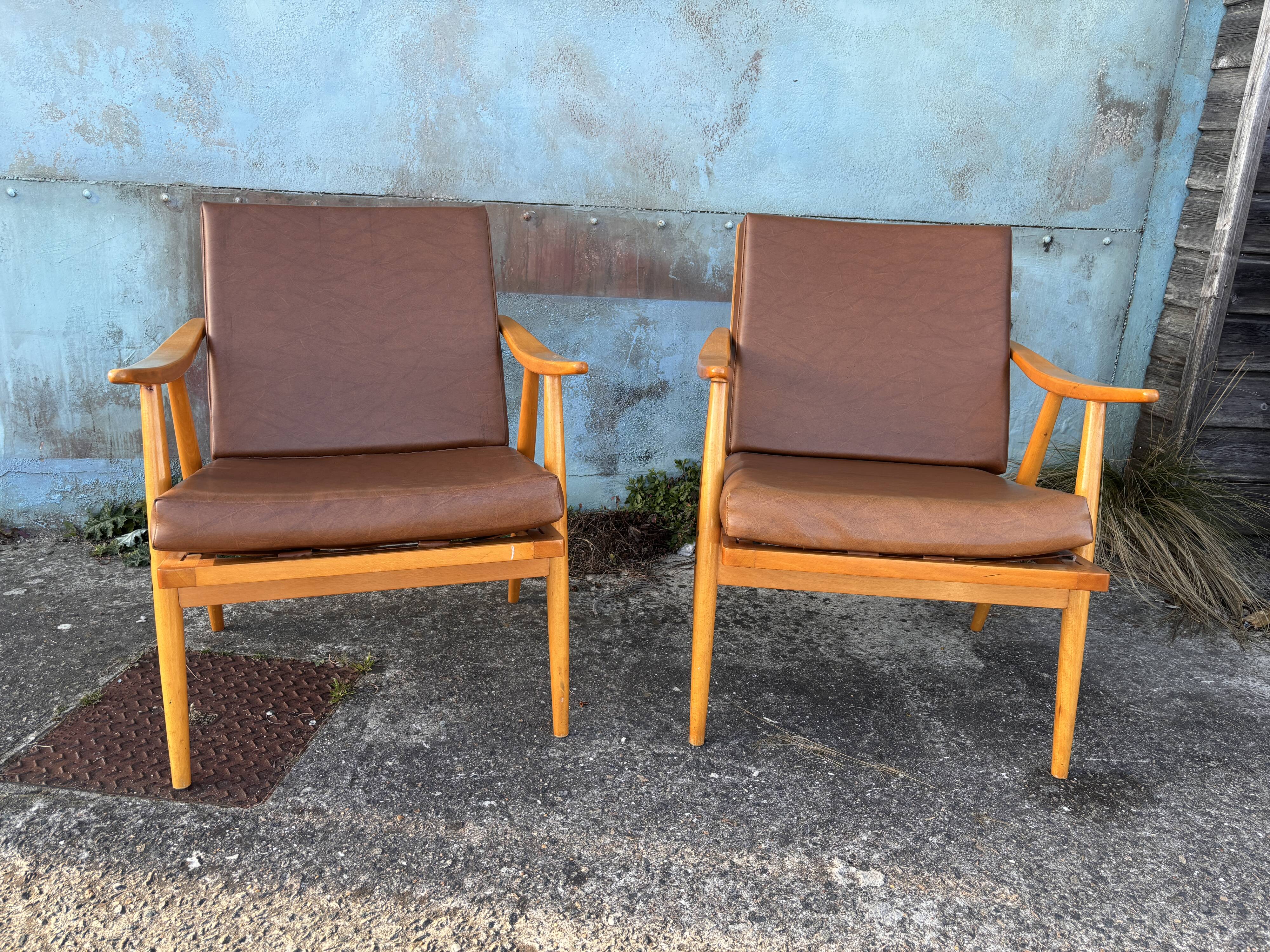 Pair of vintage armchairs with compass legs, "Boomerang" model by THO editions.