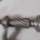 Poignèe de porte d' ntrée en bronze argenté.