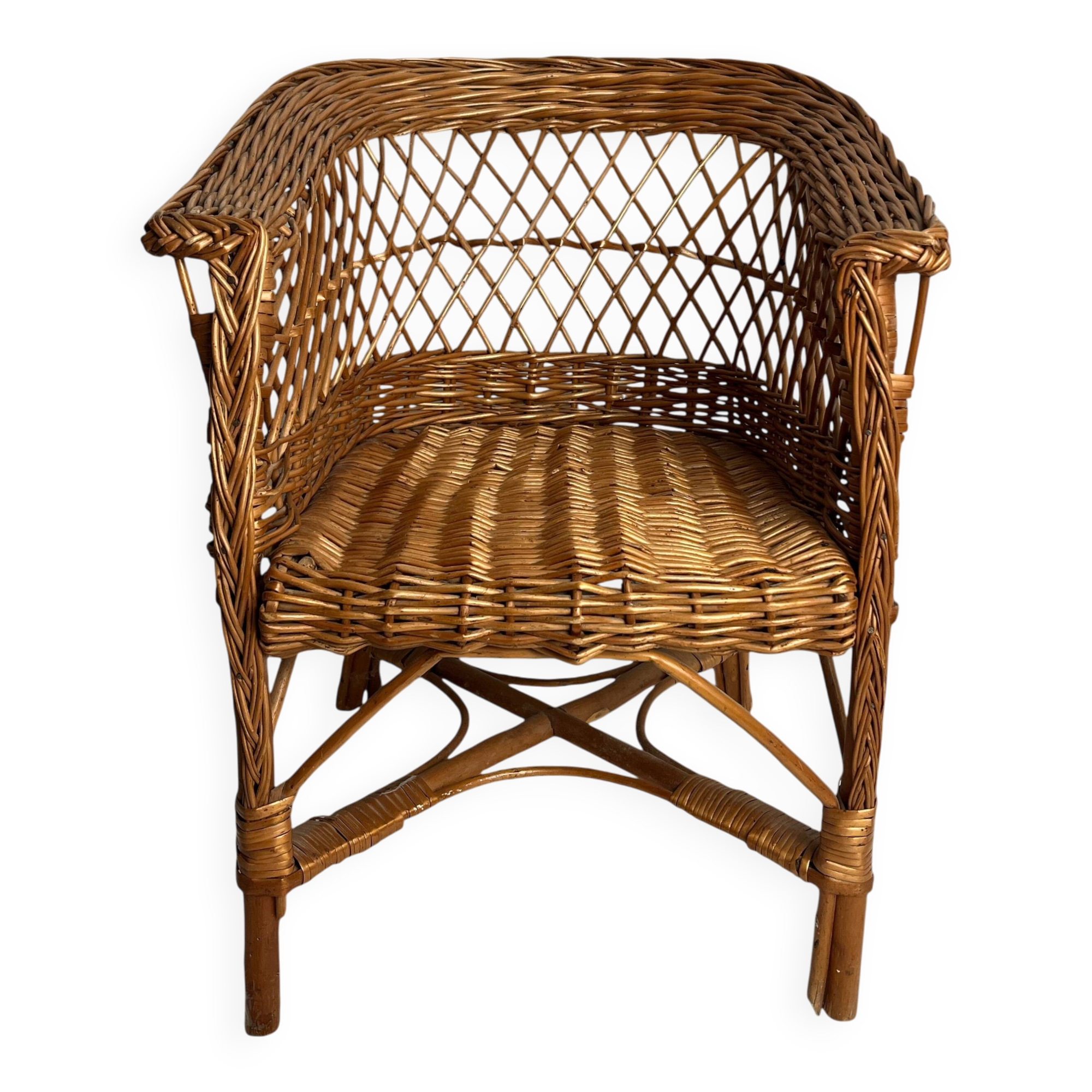 Vintage, children's armchair in woven rattan from around 1970.