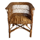 Vintage, children's armchair in woven rattan from around 1970.