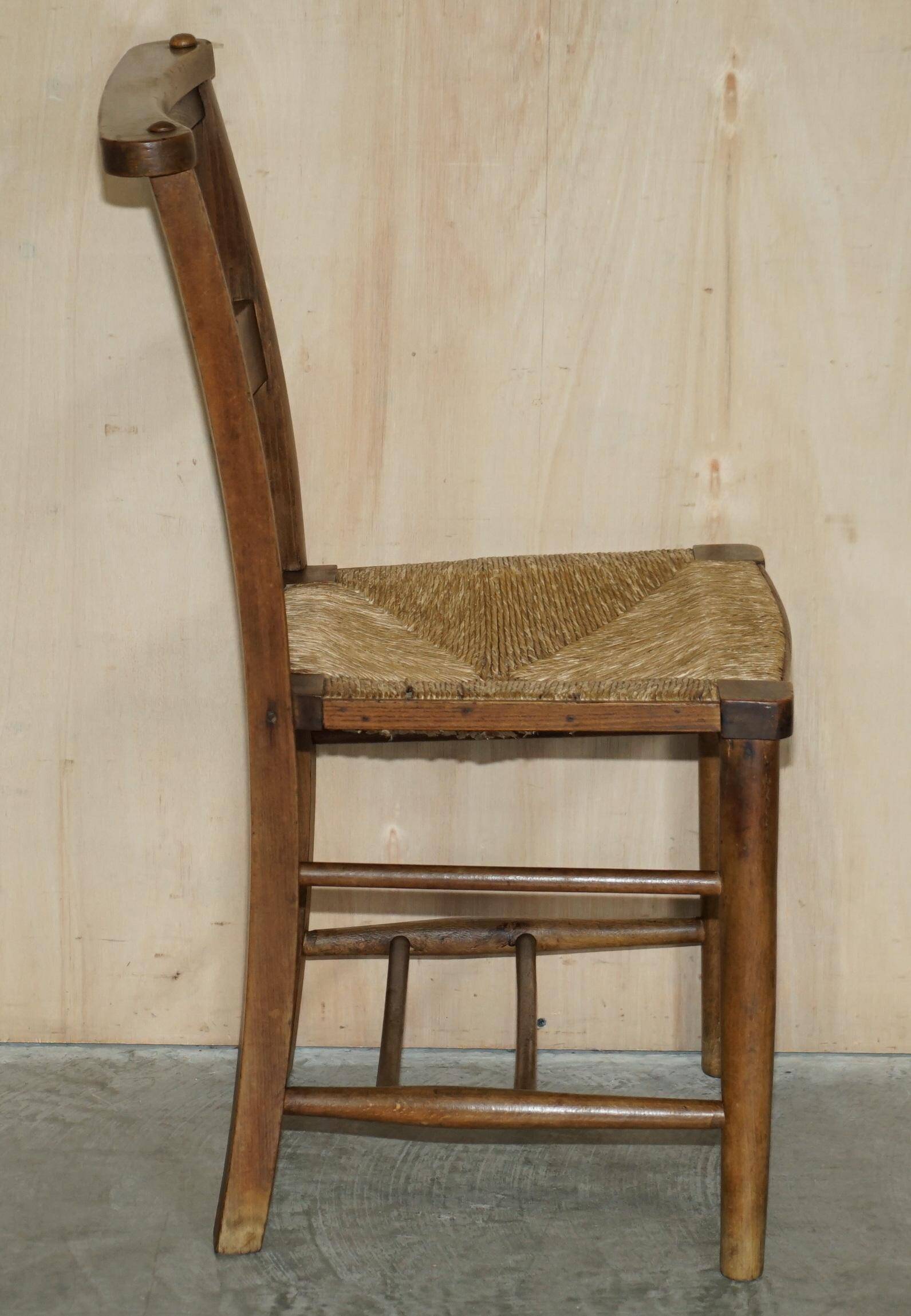 Set of six Dutch oak chairs with woven straw seats, circa 1860.