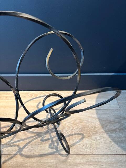 Vintage wrought iron magazine rack