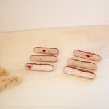 Knife holders in red slurry twist pattern