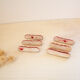 Knife holders in red slurry twist pattern