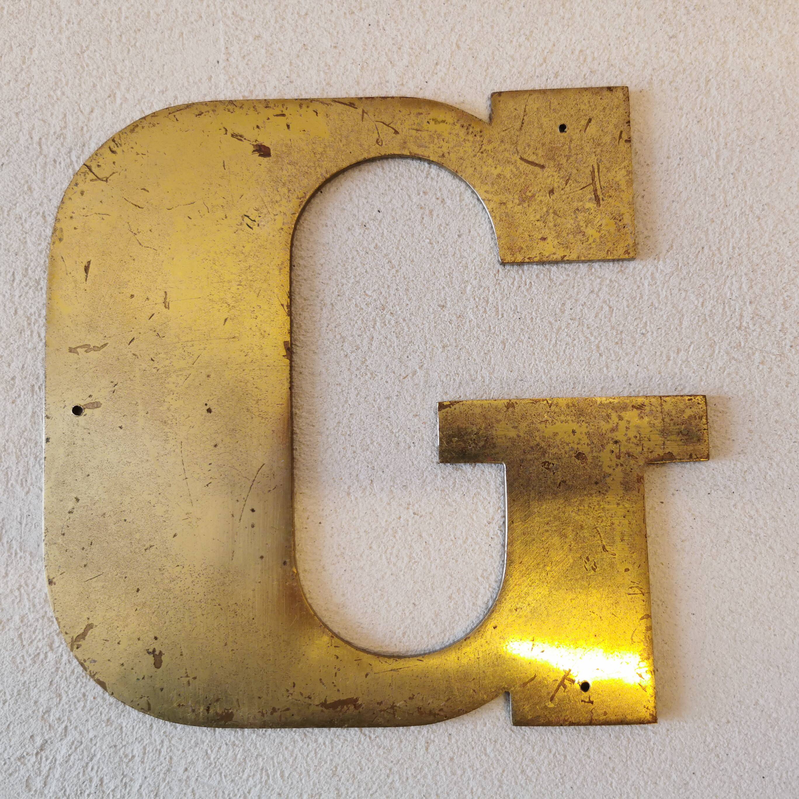 Letter "G" in brass