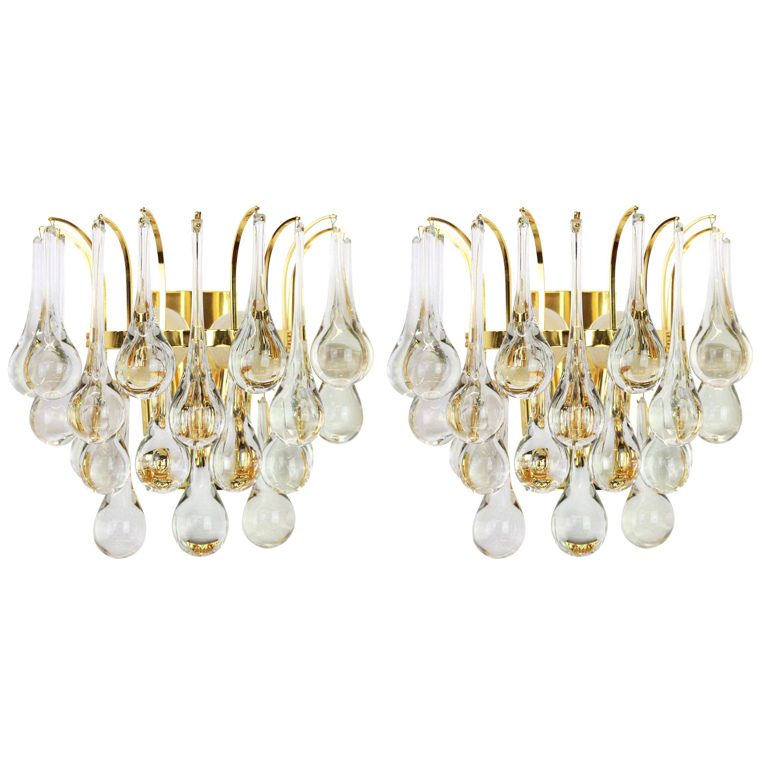 Large pair of gilt brass and crystal wall lights by Palwa, Germany, 1970s.