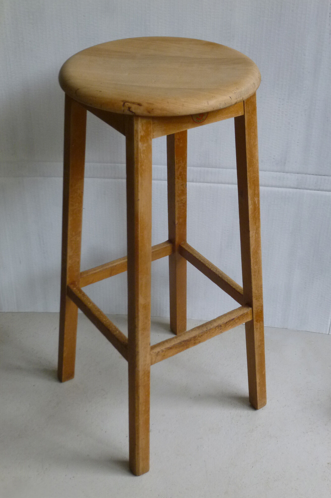 High wooden stool