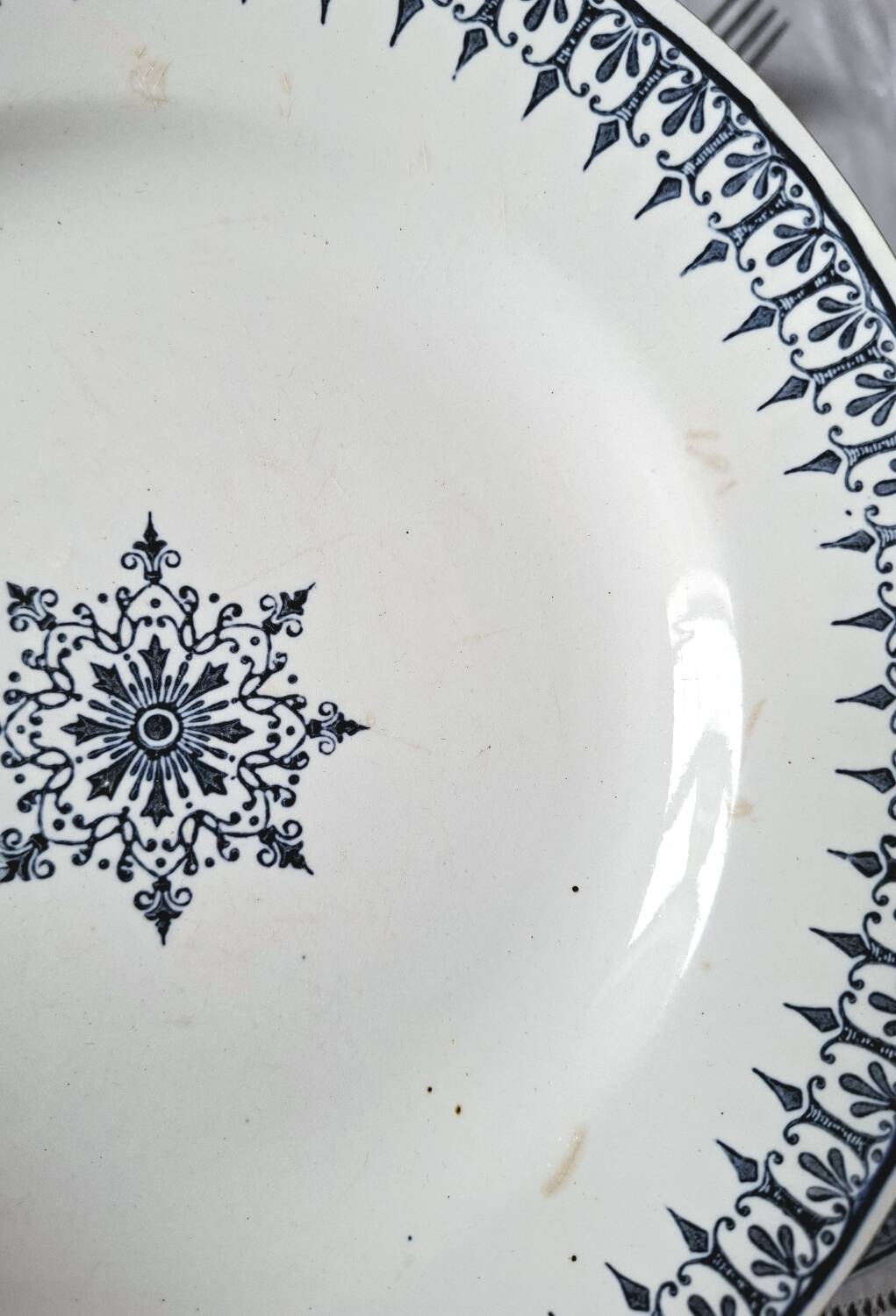 Mismatched antique ironstone dinner plates