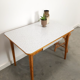 Vintage wooden dining table with formica top