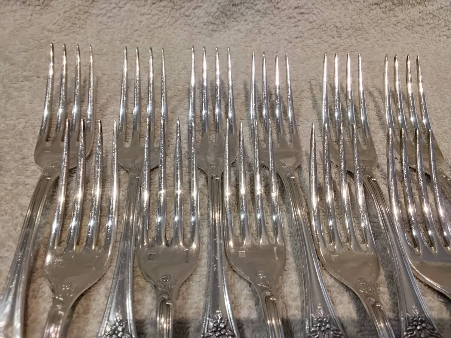 12 silver-plated metal table forks by Boulenger in the Louis XV style, demi-rich.