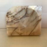 Asymmetrical marble ashtray emptier
