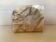 Asymmetrical marble ashtray emptier