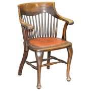 Antique English Edwardian captain's chair in oak by Ralph Johnson.