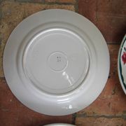 4 plates in faience of Badonviller F.B, floral motif, 20s