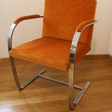 Chrome-plated metal and orange fabric armchair, 1970