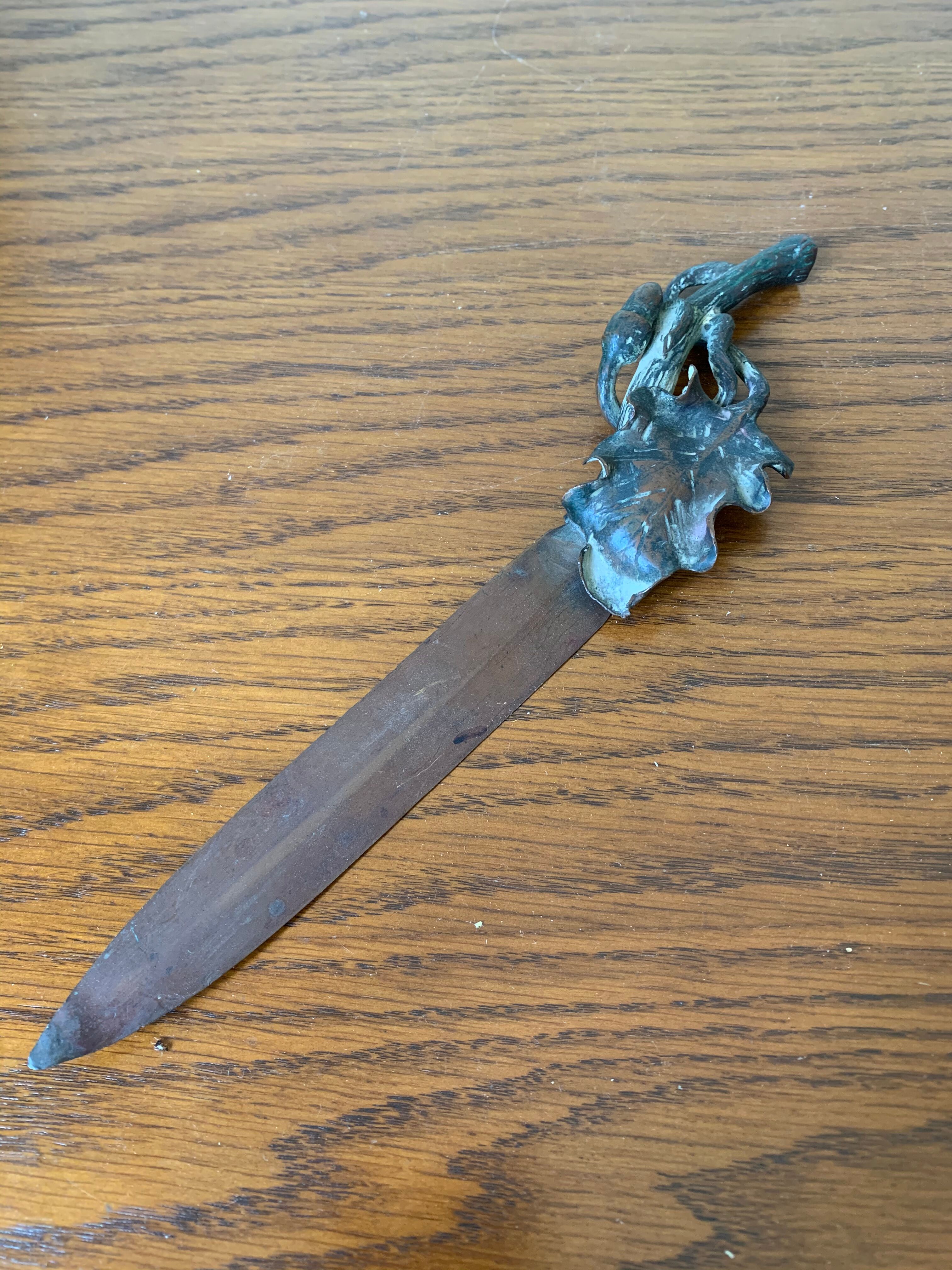 Letter opens, oak leaf