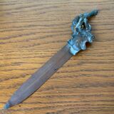 Letter opens, oak leaf